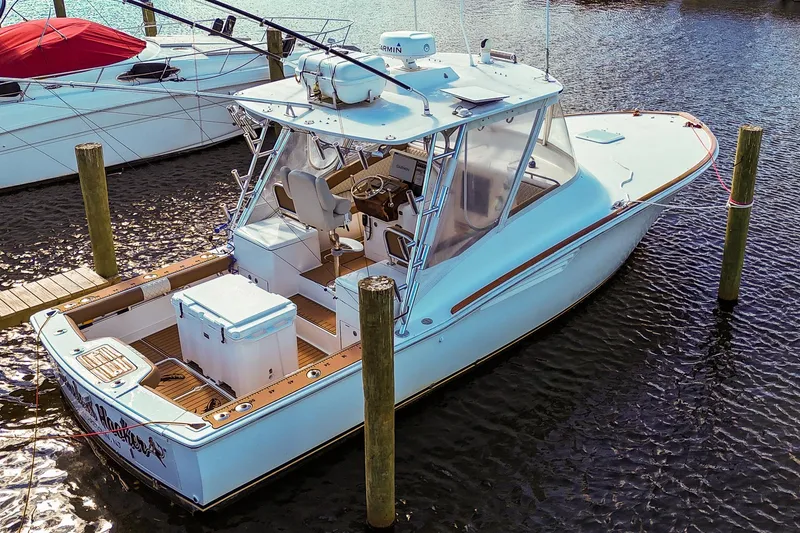 Slide: The Image of 2005 Buddy Davis 35' Express boat docked in marina, aerial view. - 32