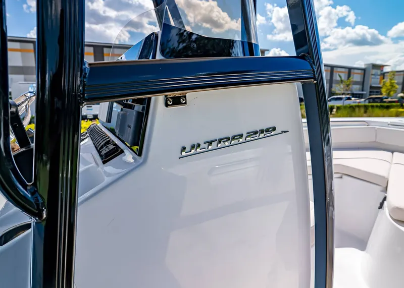 Slide: The Image of 2026 Sea Hunt Ultra 219 boat console with sleek design and modern features. - 22