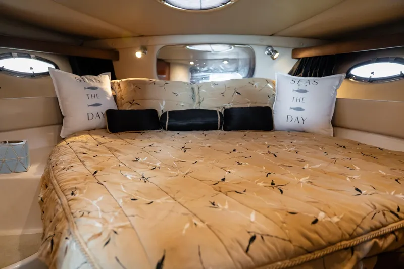 Slide: The Image of Luxurious cabin interior of 2008 Regal Commodore 4060 yacht with cozy bedding. - 17