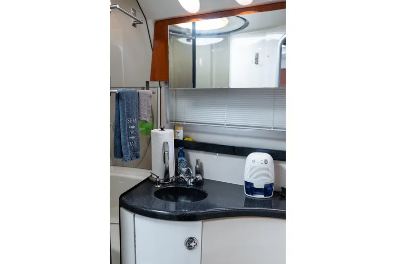 Slide: The Image of Bathroom interior of 2008 Regal Commodore 4060 yacht with sink and dehumidifier. - 19