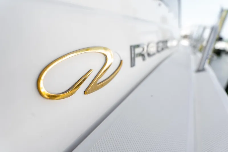 Slide: The Image of Close-up of 2008 Regal Commodore 4060 logo on boat exterior. - 7
