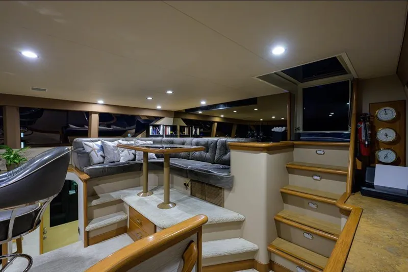 Slide: The Image of Luxurious interior of 2001 Westport Motor Yacht Raised Pilothouse with plush seating and elegant design. - 10