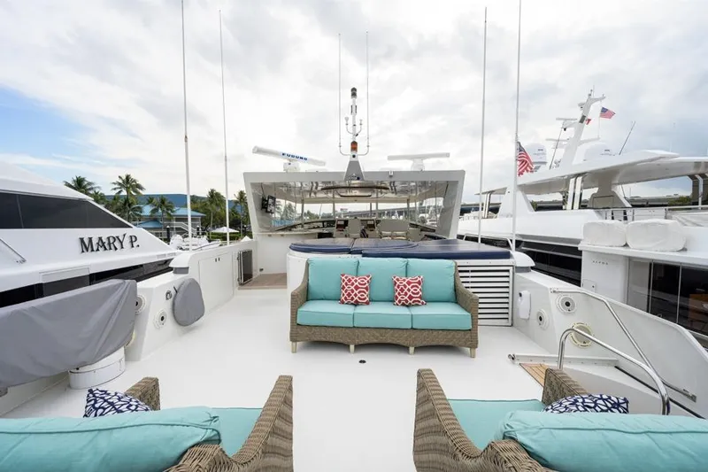 Slide: The Image of Luxurious 2001 Westport Motor Yacht Raised Pilothouse with elegant outdoor seating area. - 16