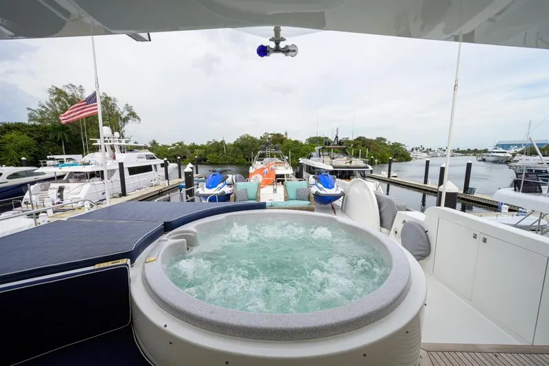 Slide: The Image of Luxurious 2001 Westport Motor Yacht with jacuzzi, docked at marina. - 18