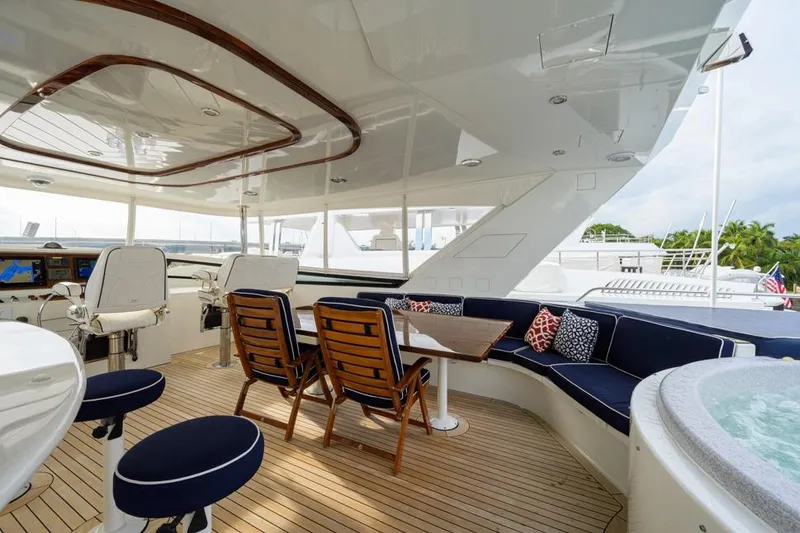 Slide: The Image of Luxurious 2001 Westport Motor Yacht Raised Pilothouse with elegant seating and navigation area. - 20