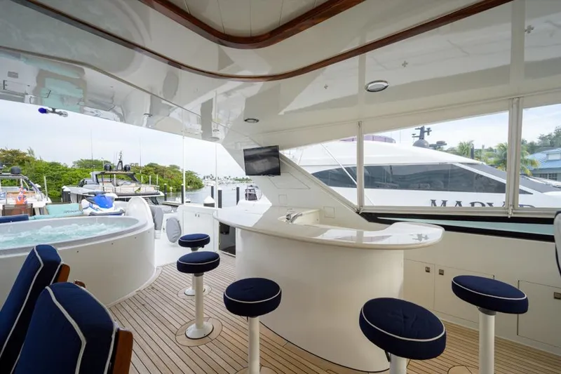 Slide: The Image of Luxurious 2001 Westport Motor Yacht Raised Pilothouse with bar and jacuzzi on deck. - 23