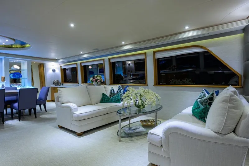Slide: The Image of Luxurious interior of 2001 Westport Motor Yacht Raised Pilothouse with elegant seating and decor. - 29