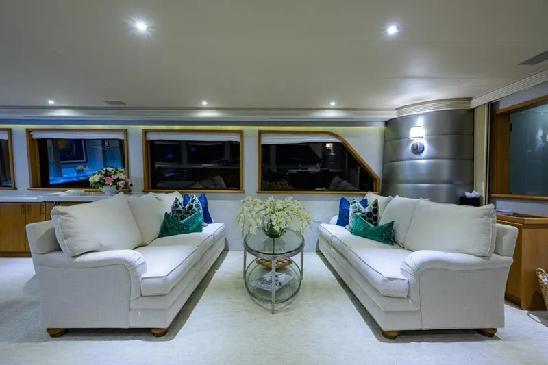 Slide: The Image of Luxurious interior of 2001 Westport Motor Yacht Raised Pilothouse with elegant sofas and decor. - 30