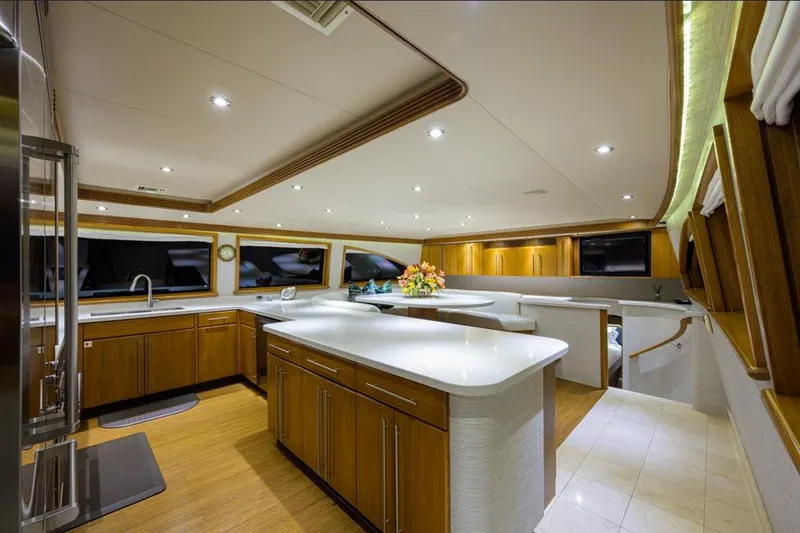 Slide: The Image of Luxurious interior of 2001 Westport Motor Yacht Raised Pilothouse with modern kitchen design. - 35