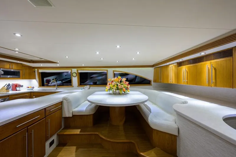 Slide: The Image of Luxurious interior of 2001 Westport Motor Yacht Raised Pilothouse with elegant dining area. - 40