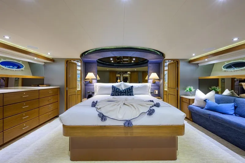 Slide: The Image of Luxurious bedroom interior of 2001 Westport Motor Yacht Raised Pilothouse, featuring elegant decor and lighting. - 47
