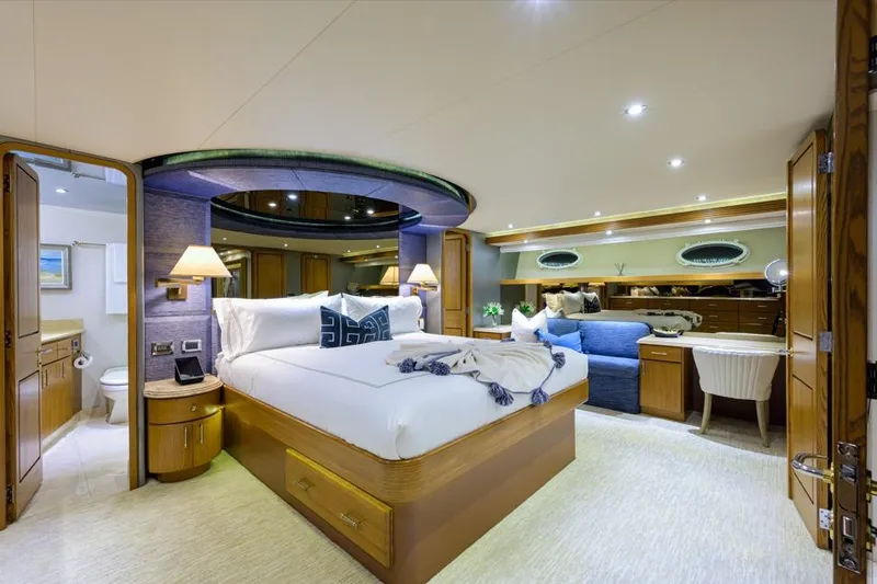 Slide: The Image of Luxurious bedroom interior of 2001 Westport Motor Yacht Raised Pilothouse, featuring elegant furnishings. - 49