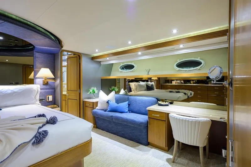Slide: The Image of Luxurious 2001 Westport Motor Yacht cabin with elegant decor and cozy seating area. - 50