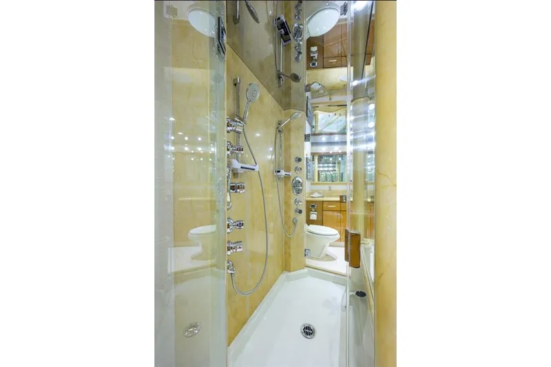 Slide: The Image of Luxurious bathroom in 2001 Westport Motor Yacht Raised Pilothouse, featuring modern shower fixtures. - 53