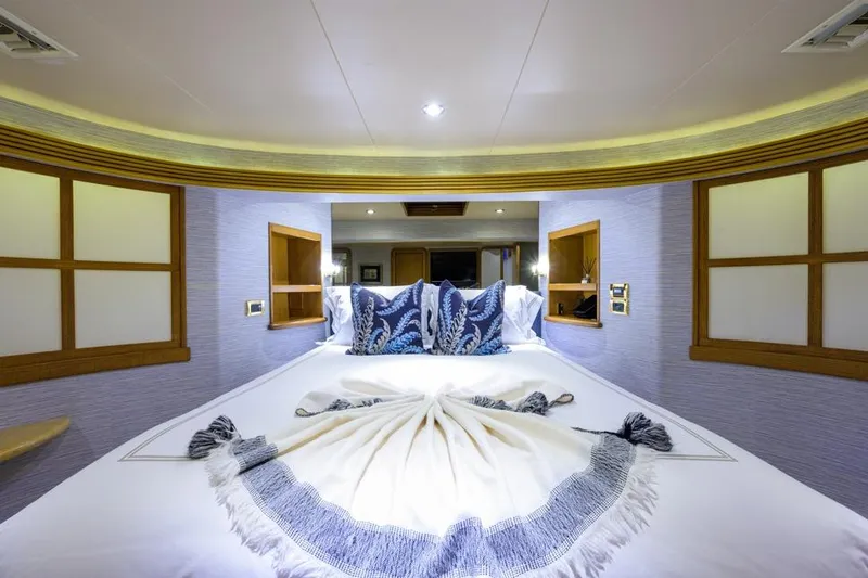 Slide: The Image of Luxurious bedroom interior of 2001 Westport Motor Yacht Raised Pilothouse with elegant decor. - 57