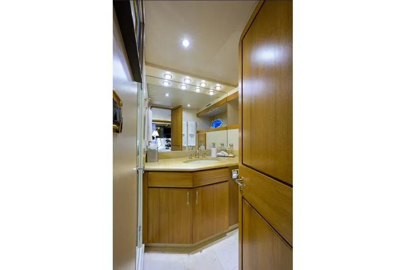 Slide: The Image of Luxurious bathroom interior of 2001 Westport Motor Yacht Raised Pilothouse with wooden cabinetry. - 60