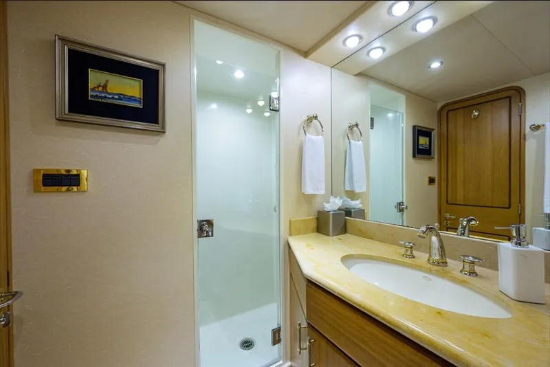 Slide: The Image of Luxurious bathroom in 2001 Westport Motor Yacht Raised Pilothouse, featuring elegant fixtures and modern design. - 62