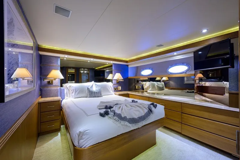 Slide: The Image of Luxurious bedroom interior of 2001 Westport Motor Yacht Raised Pilothouse with elegant decor. - 64