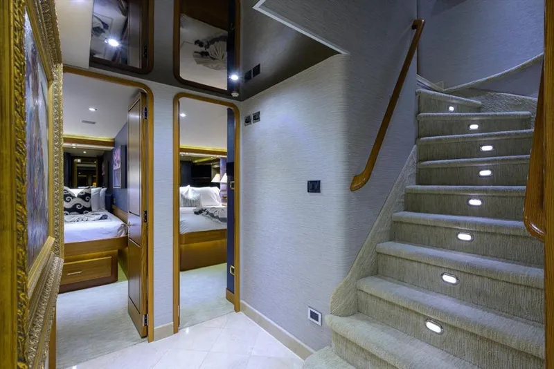 Slide: The Image of Luxurious interior of 2001 Westport Motor Yacht Raised Pilothouse with elegant staircase and bedrooms. - 67