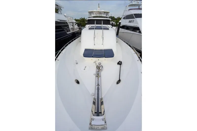 Slide: The Image of 2001 Westport Motor Yacht Raised Pilothouse deck view with anchor and seating. - 68