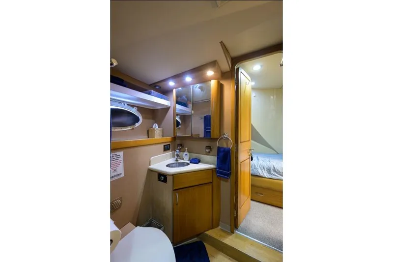 Slide: The Image of Luxurious bathroom interior of 2001 Westport Motor Yacht Raised Pilothouse, featuring modern amenities. - 79