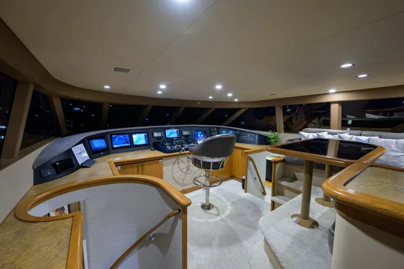 Slide: The Image of Luxurious 2001 Westport Motor Yacht Raised Pilothouse interior with modern navigation equipment. - 8