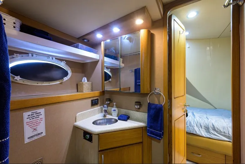 Slide: The Image of Luxurious bathroom in 2001 Westport Motor Yacht Raised Pilothouse with modern amenities. - 80