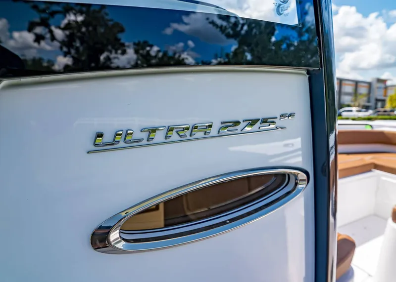 Slide: The Image of 2026 Sea Hunt Ultra 275 SE boat emblem with sleek design details. - 21
