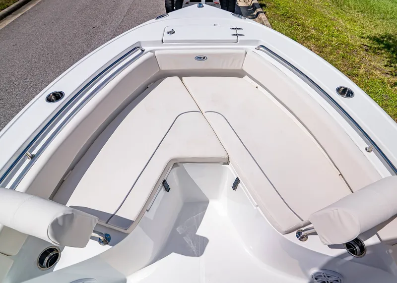 Slide: The Image of 2026 Sea Hunt Ultra 219 boat with spacious seating and sleek design. - 21
