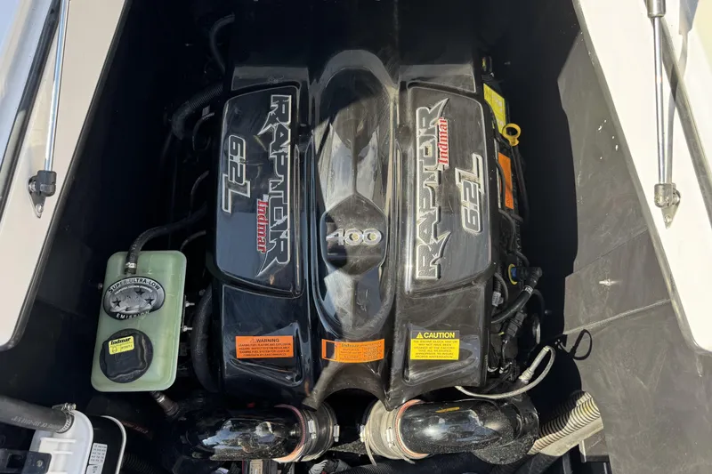 Slide: The Image of Engine of 2019 Tigé ZX1 boat, featuring a Raptor 6.2L motor. - 10