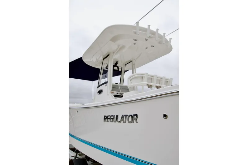 Slide: The Image of 2026 Regulator 25 boat with sleek design and modern features. - 4