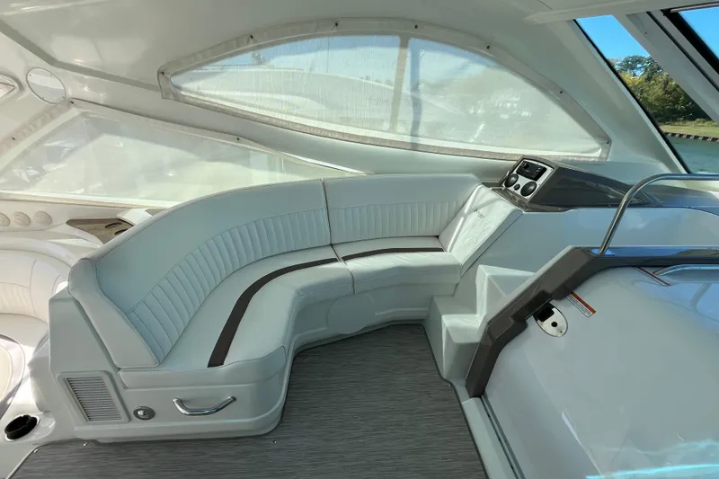 Slide: The Image of Luxurious interior of 2010 Cruisers Yachts 520 Sports Coupe with sleek seating and modern design. - 11