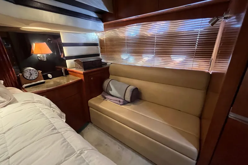 Slide: The Image of Luxurious interior of 2010 Cruisers Yachts 520 Sports Coupe with cozy seating and elegant decor. - 24