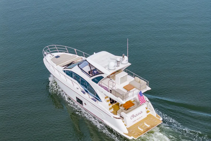 Slide: The Image of Aerial view of 2020 Azimut Fly 50 yacht cruising on calm waters. - 17