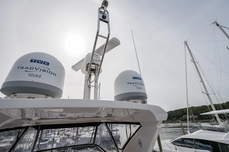 Slide: The Image of Azimut Fly 50 yacht with TracVision satellite domes, 2020 model, docked at marina. - 73