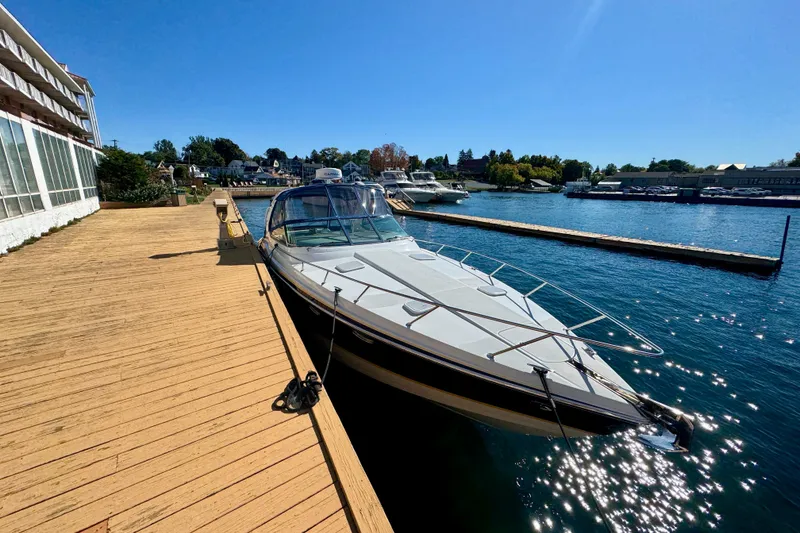 Slide: The Image of 2006 Formula 370 Super Sport docked at a sunny marina. - 1