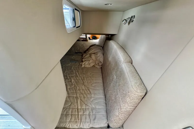 Slide: The Image of Interior cabin of 2006 Formula 370 Super Sport with cozy bed and window. - 19