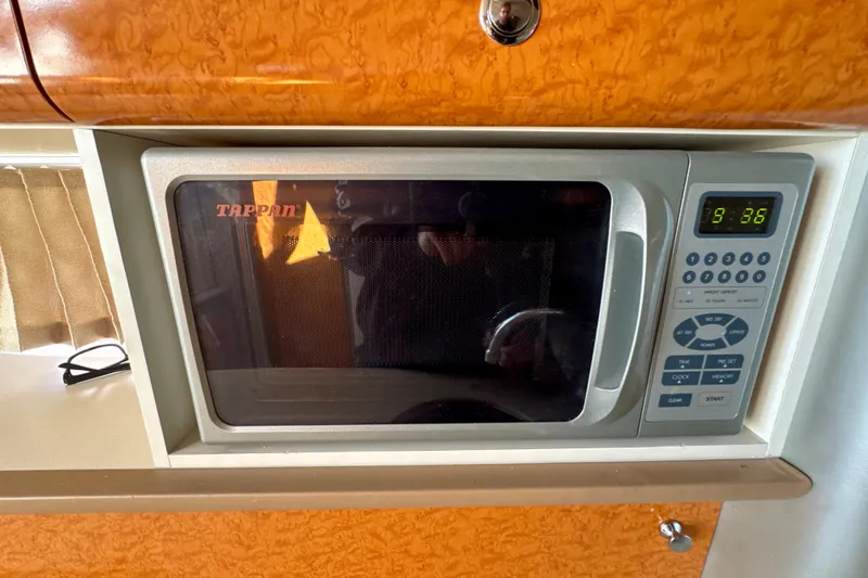 Slide: The Image of Tappan microwave in 2006 Formula 370 Super Sport boat interior. - 23