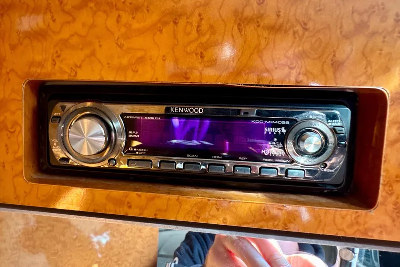 Slide: The Image of Kenwood stereo system in 2006 Formula 370 Super Sport boat dashboard. - 24