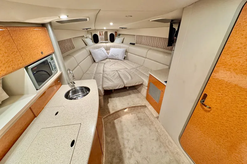 Slide: The Image of Interior of 2006 Formula 370 Super Sport yacht with kitchenette and cozy seating area. - 33