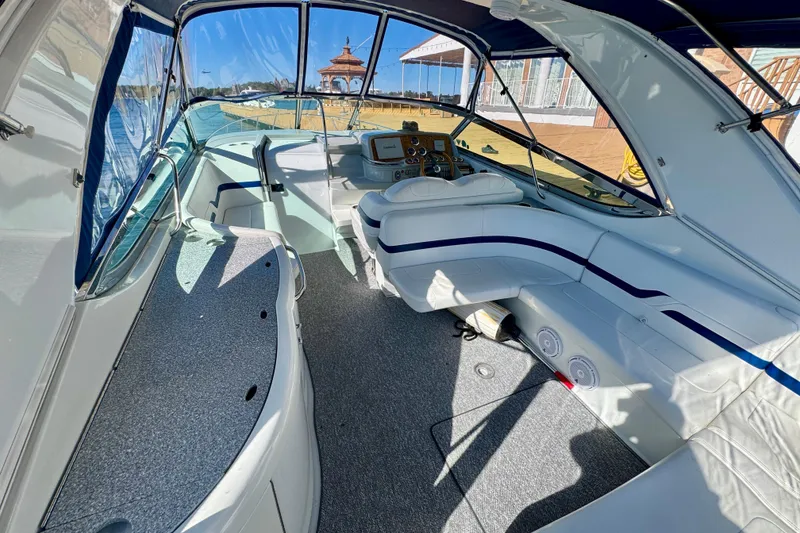 Slide: The Image of 2006 Formula 370 Super Sport boat interior with sleek seating and modern dashboard. - 6