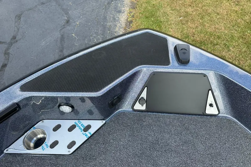 Slide: The Image of 2026 Lund 189 Pro-V GL boat deck with control panel and cup holder. - 14