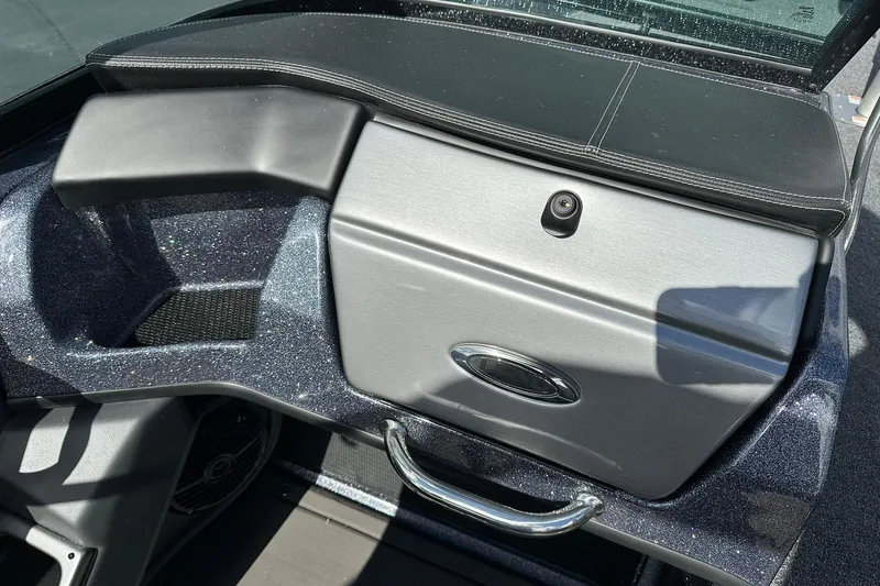 Slide: The Image of 2026 Lund 189 Pro-V GL boat dashboard with sleek design and metallic finish. - 24