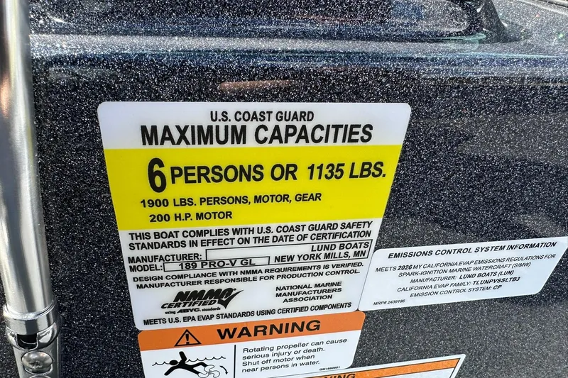 Slide: The Image of 2026 Lund 189 Pro-V GL capacity label: 6 persons or 1135 lbs, 200 HP motor. - 30