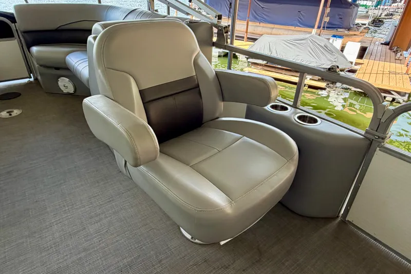 Slide: The Image of 2021 Lowe SS 270 Extended WT boat seat with armrests and cup holders. - 16