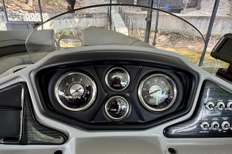 Slide: The Image of Dashboard of 2021 Lowe SS 270 Extended WT boat with gauges and controls. - 22