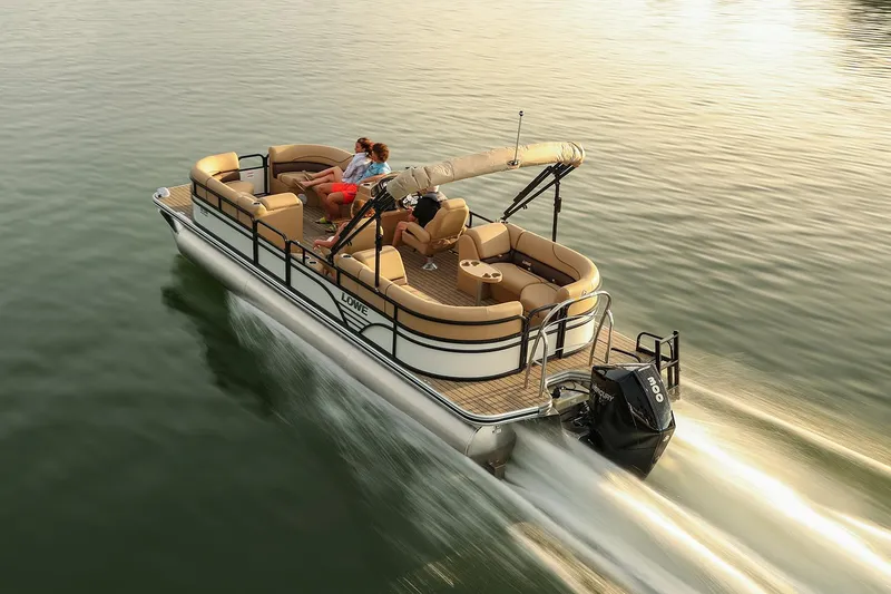 Slide: The Image of Manufacturer Provided Image: 2021 Lowe SS270 Extended Walk-Thru pontoon boat cruising on calm water. - 31