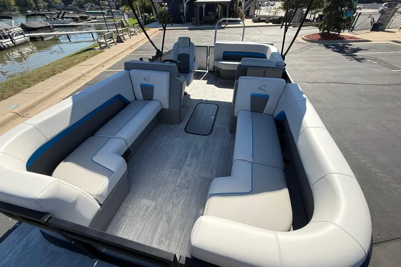 Slide: The Image of 2026 Qwest E-Class 22 Lanai pontoon boat with spacious seating and modern design. - 12