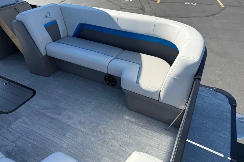 Slide: The Image of Luxurious seating on 2026 Qwest E-Class 22 Lanai pontoon boat, featuring sleek design and comfort. - 9