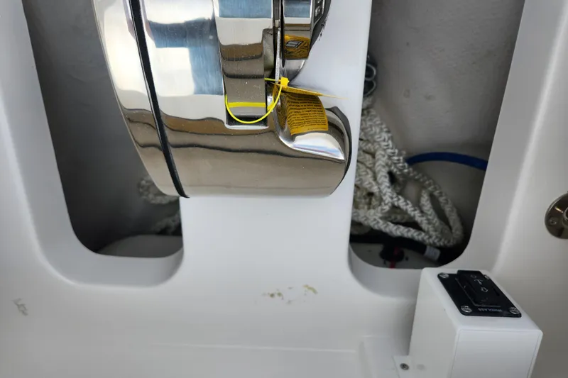 Slide: The Image of 2026 Caymas 291 boat detail with chrome hardware and coiled rope. - 6